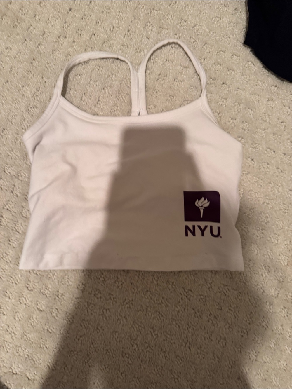 Beyond yoga, white NYU crop tank